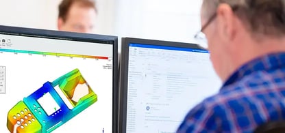 An engineer working with Cadmould